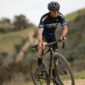 Cyclist wearing Giant cycling gear and accessories riding a Giant bicycle on a scenic rout